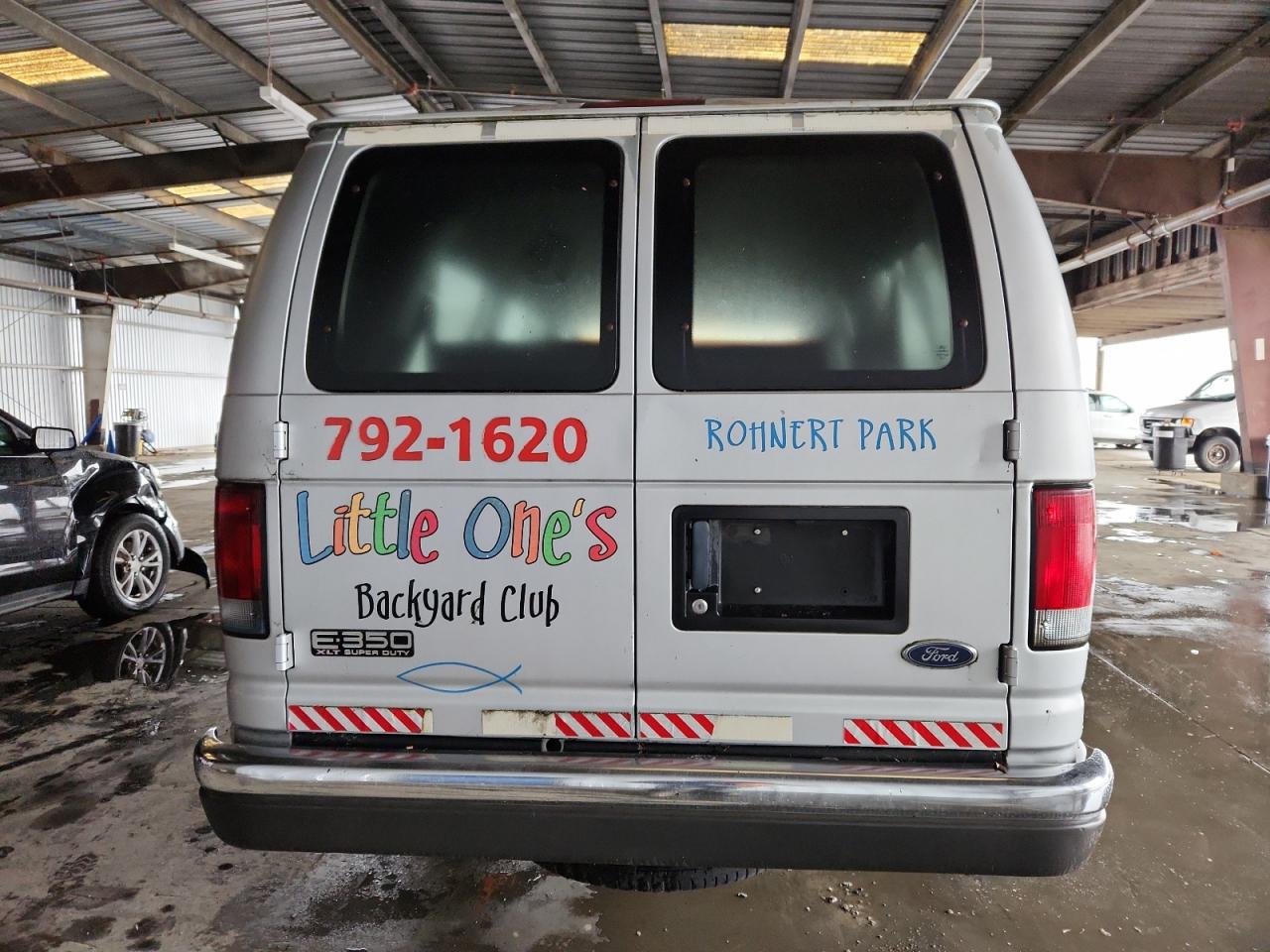 2002 Ford Econoline E350 Super Duty Wagon VIN: 1FBSS31L72HA23832 Lot: 92499675