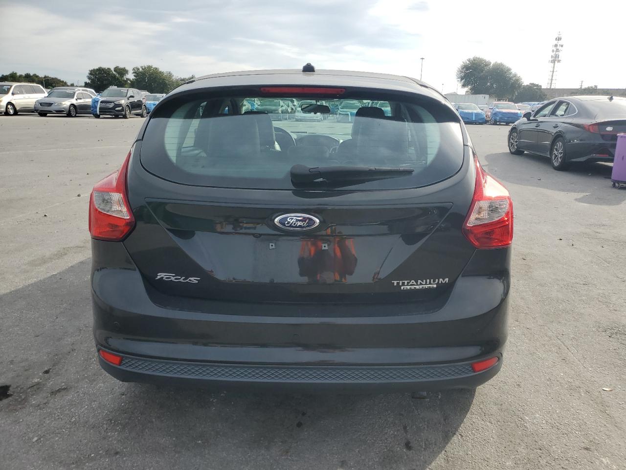 2013 Ford Focus Titanium VIN: 1FADP3N22DL217391 Lot: 90852845