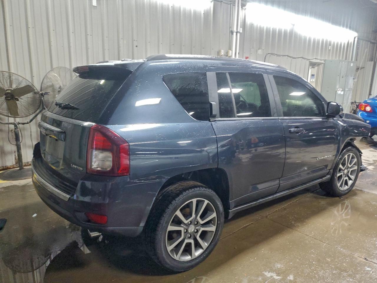 2014 Jeep Compass Limited VIN: 1C4NJCCB1ED652580 Lot: 94750435