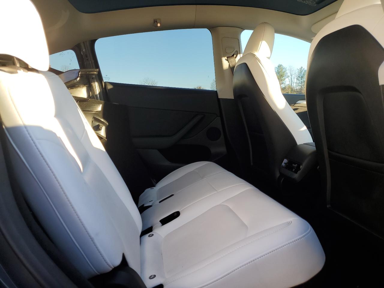 2023 Tesla Model Y VIN: 7SAYGDEEXPF846936 Lot: 84642675