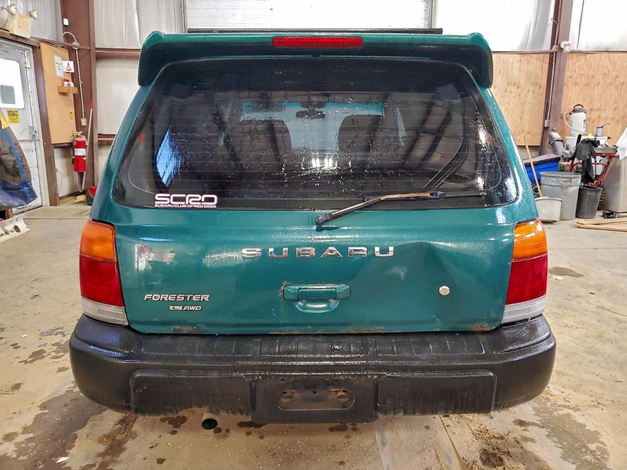 1998 Subaru Forester L VIN: JF1SF6350WG750330 Lot: 93550415