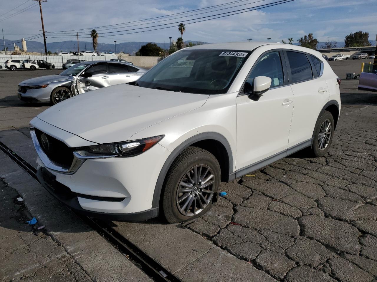 2021 Mazda Cx-5 Touring VIN: JM3KFACM1M0481742 Lot: 92344365