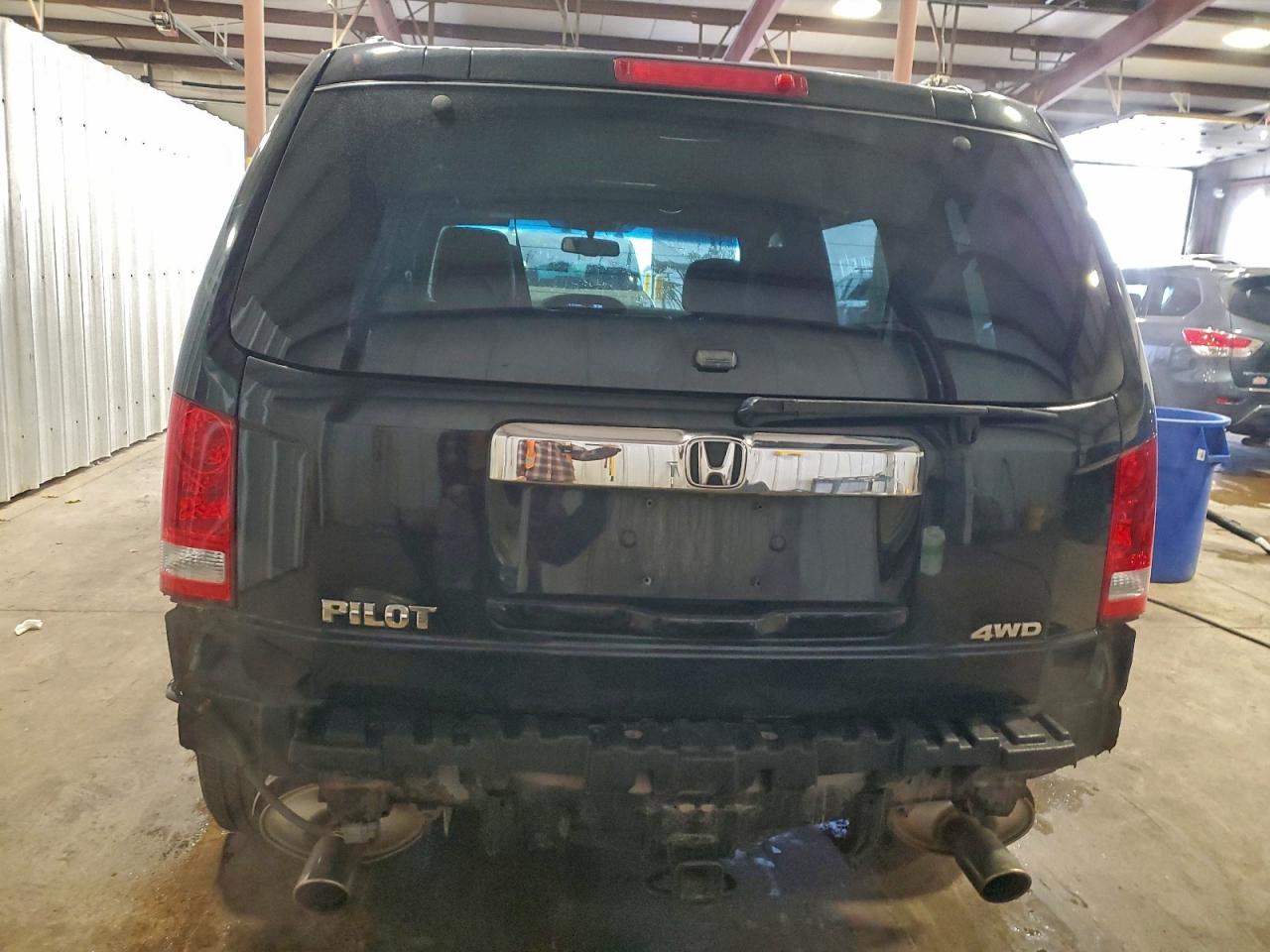 2012 Honda Pilot Exl VIN: 5FNYF4H59CB066870 Lot: 93520405