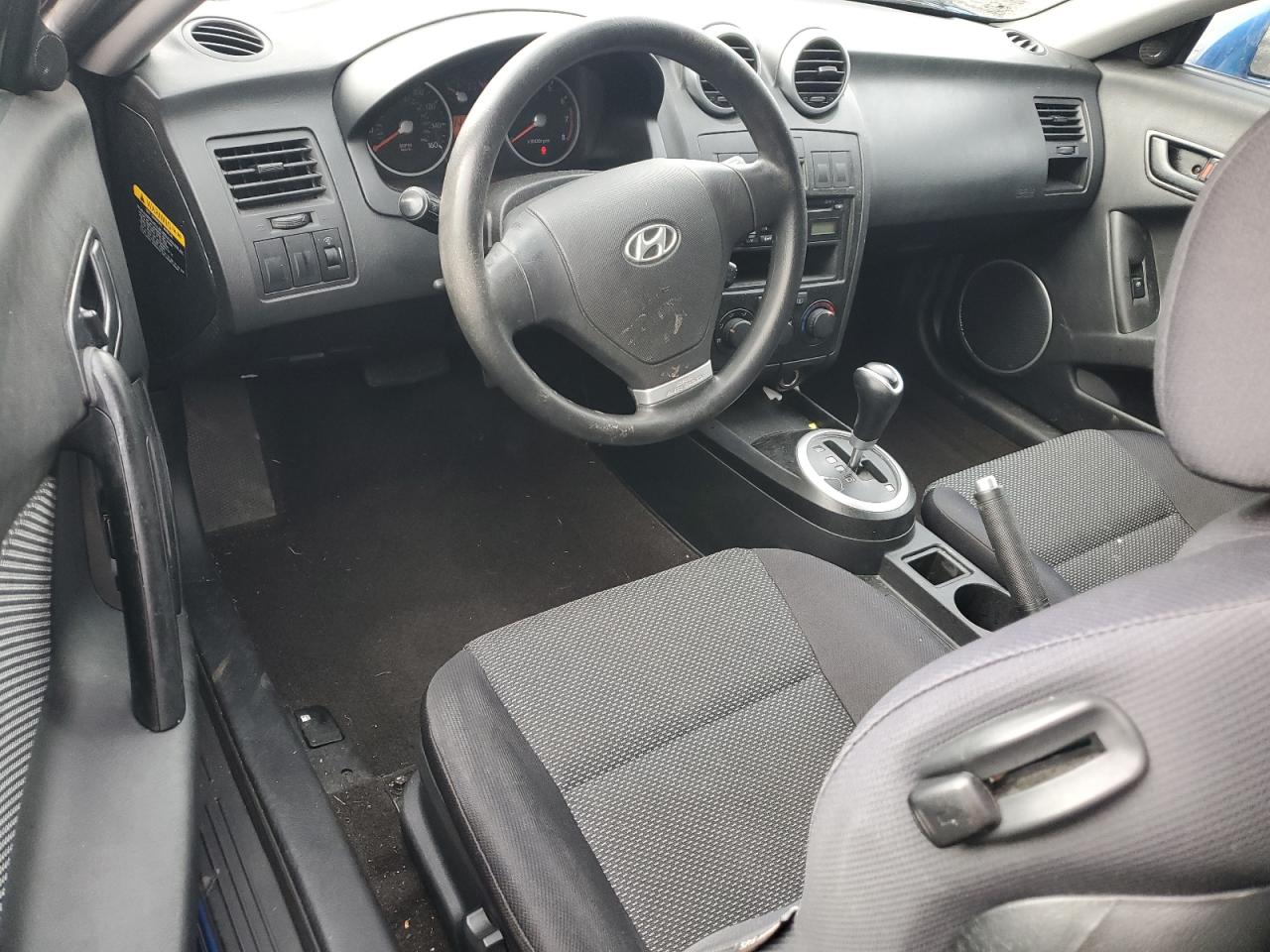 2005 Hyundai Tiburon VIN: KMHHM65DX5U168083 Lot: 91311075