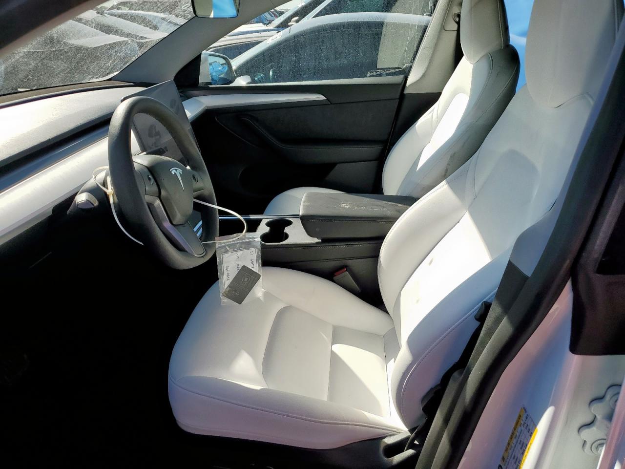 2023 Tesla Model Y VIN: 7SAYGDEE1PA107810 Lot: 89910945