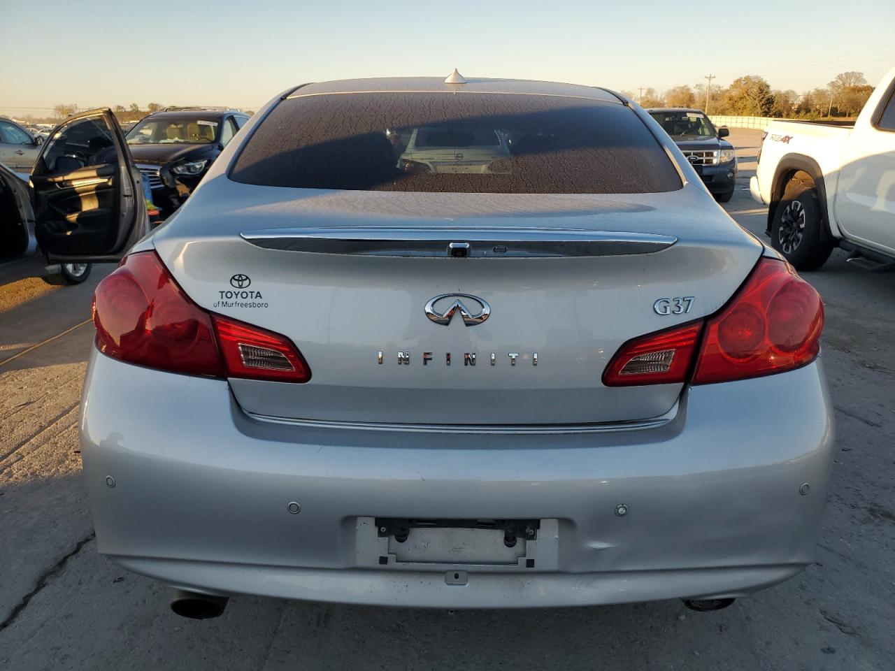 2013 Infiniti G37 Base VIN: JN1CV6AP4DM301594 Lot: 91988635