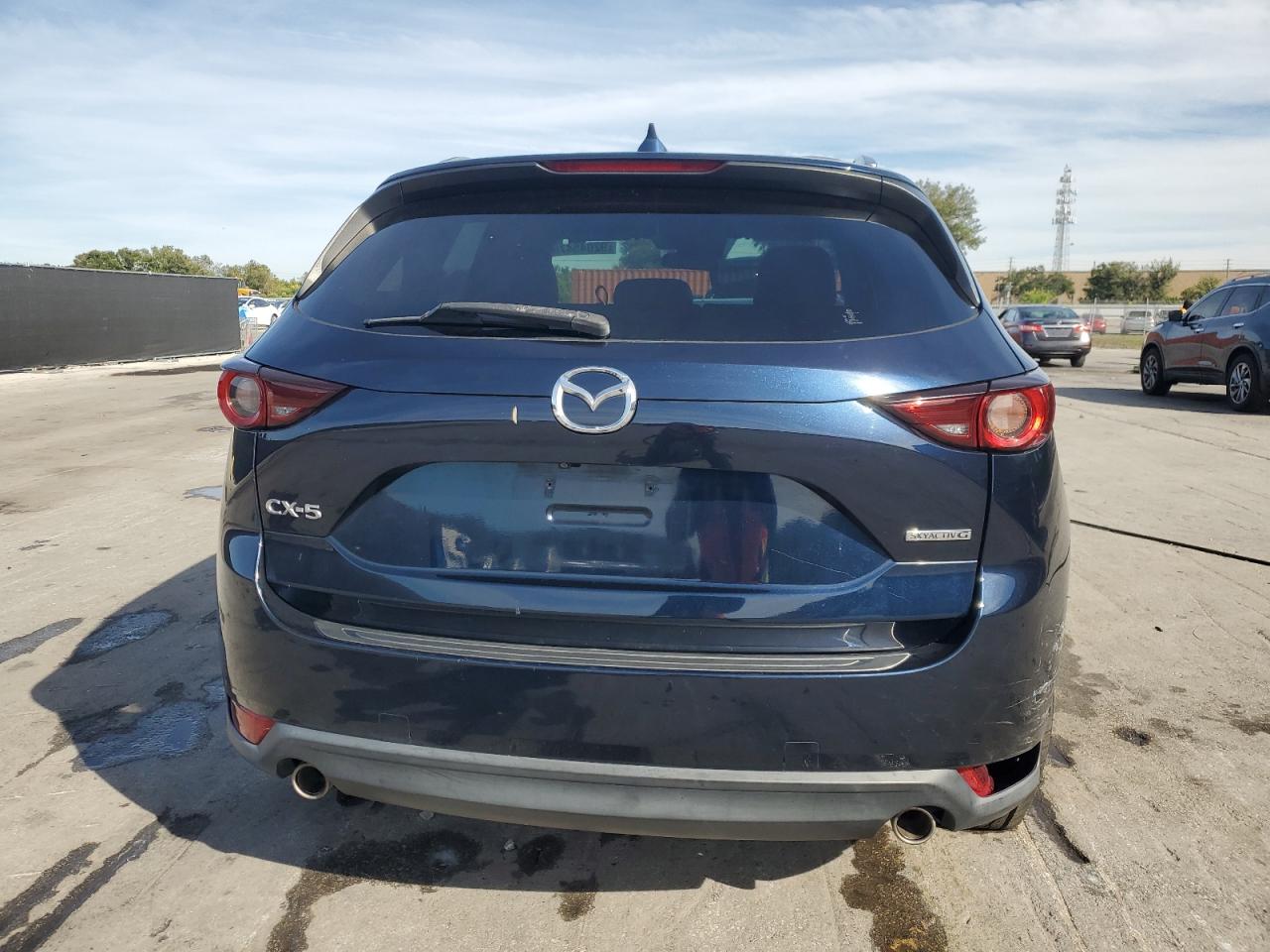 2020 Mazda Cx-5 Touring VIN: JM3KFACM7L0769277 Lot: 92045475