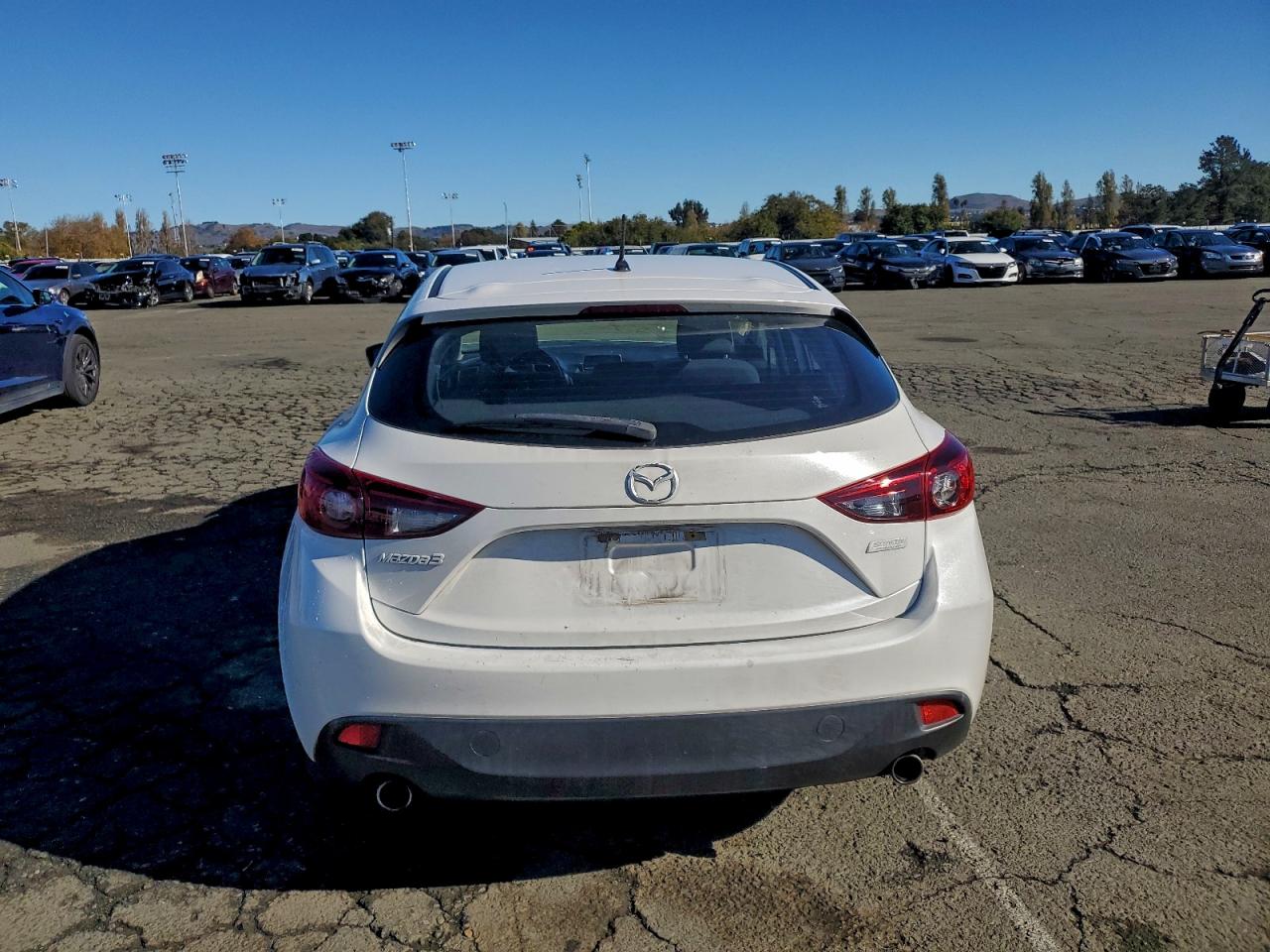 2014 Mazda 3 Touring VIN: JM1BM1L75E1162879 Lot: 94003125