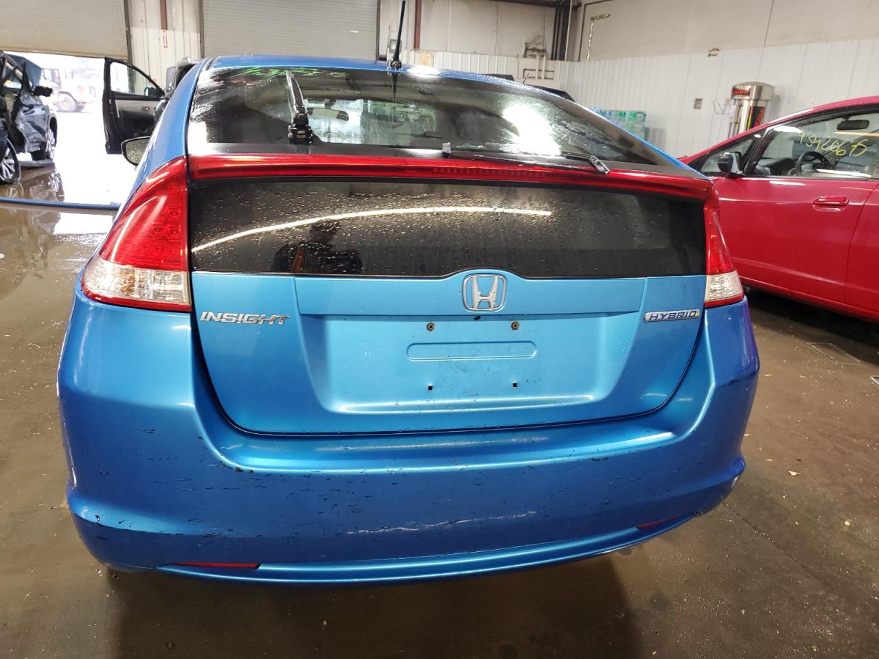 2010 Honda Insight Ex VIN: JHMZE2H73AS036498 Lot: 93460445