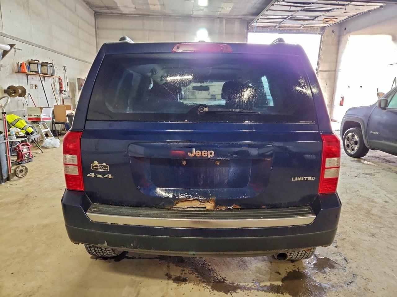 2014 Jeep Patriot Limited VIN: 1C4NJRCB8ED916882 Lot: 93923945