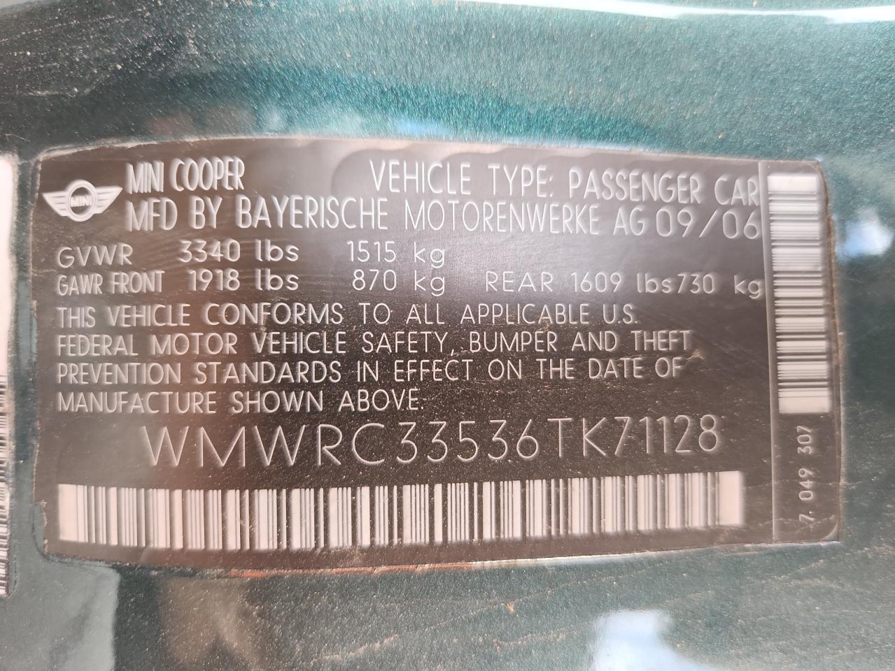 2006 Mini Cooper VIN: WMWRC33536TK71128 Lot: 92328415