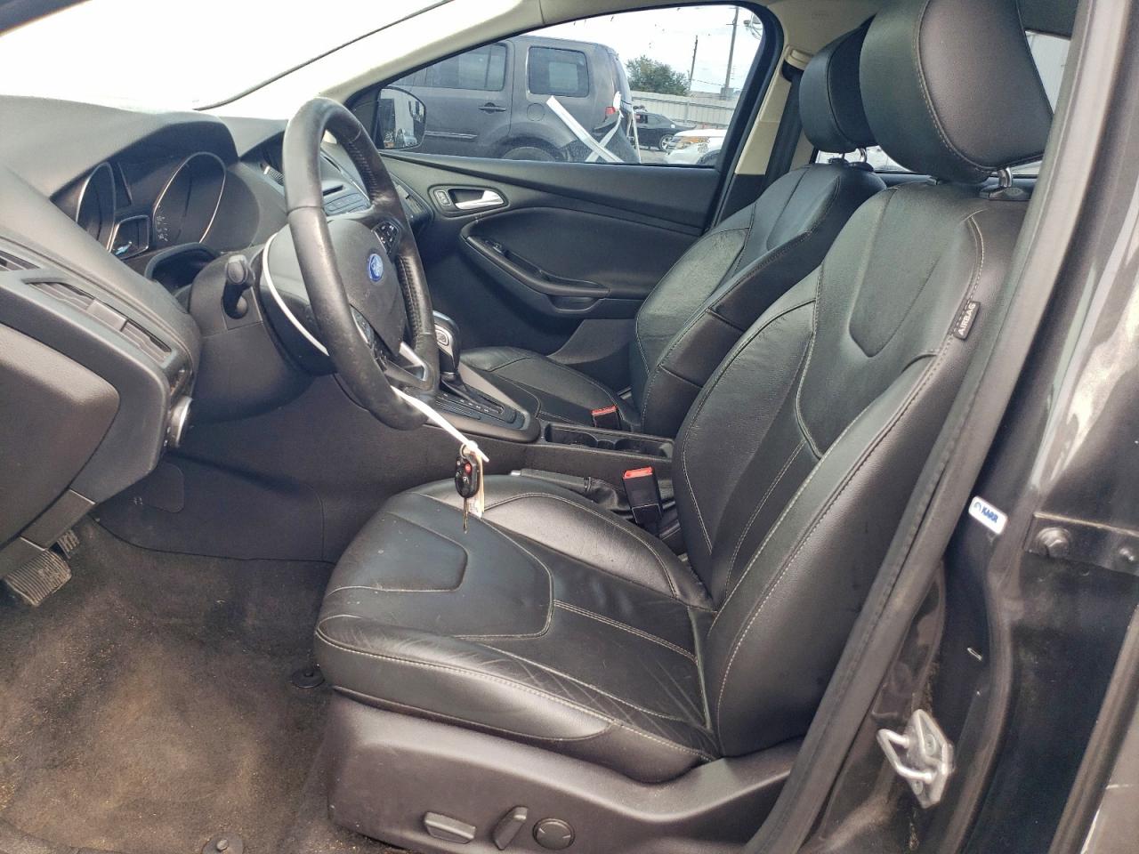 2016 Ford Focus Se VIN: 1FADP3F26GL301474 Lot: 94105255