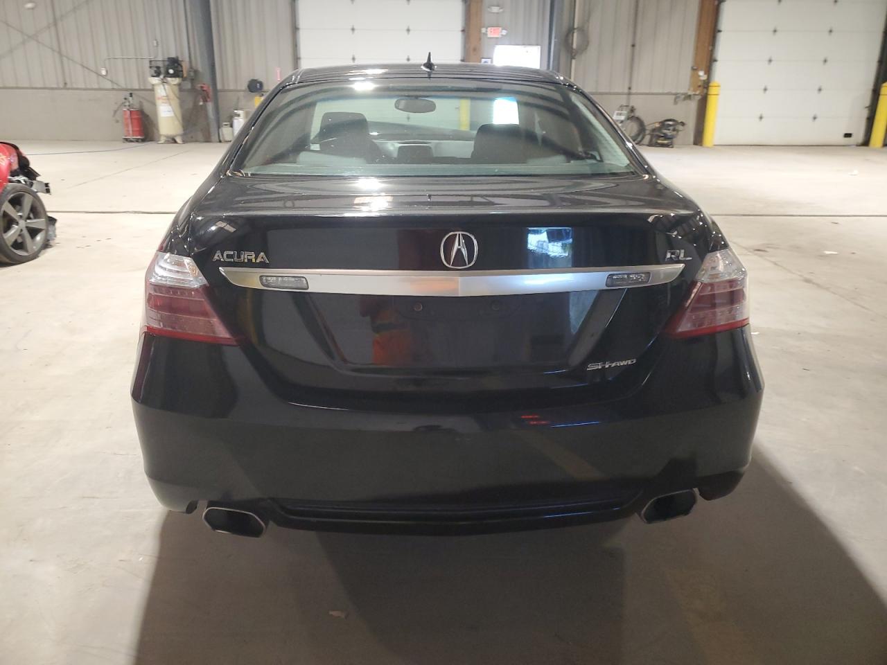 2010 Acura Rl VIN: JH4KB2F65AC002223 Lot: 91330165