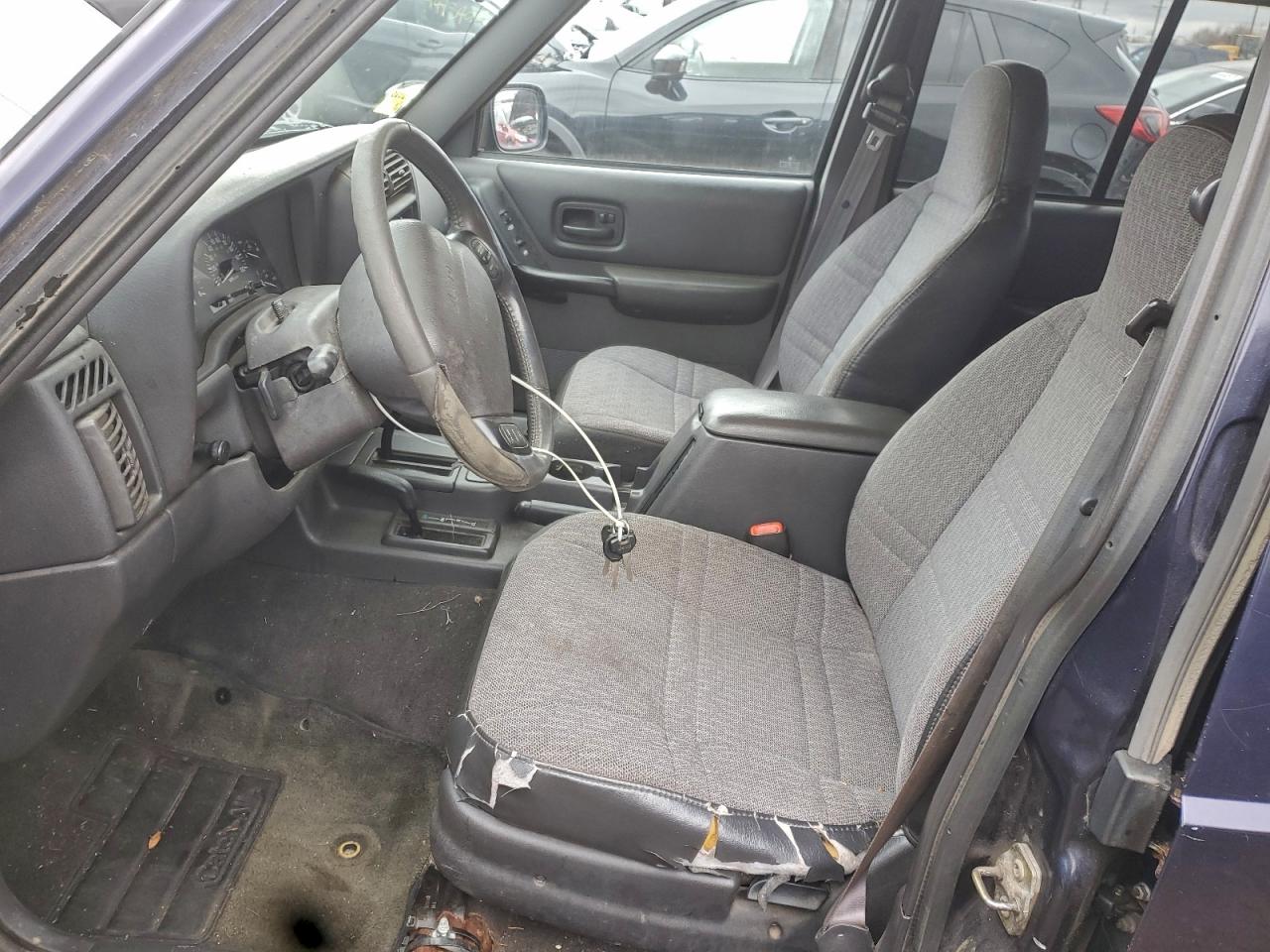 1999 Jeep Cherokee Sport VIN: 1J4FF68S3XL615162 Lot: 94251365