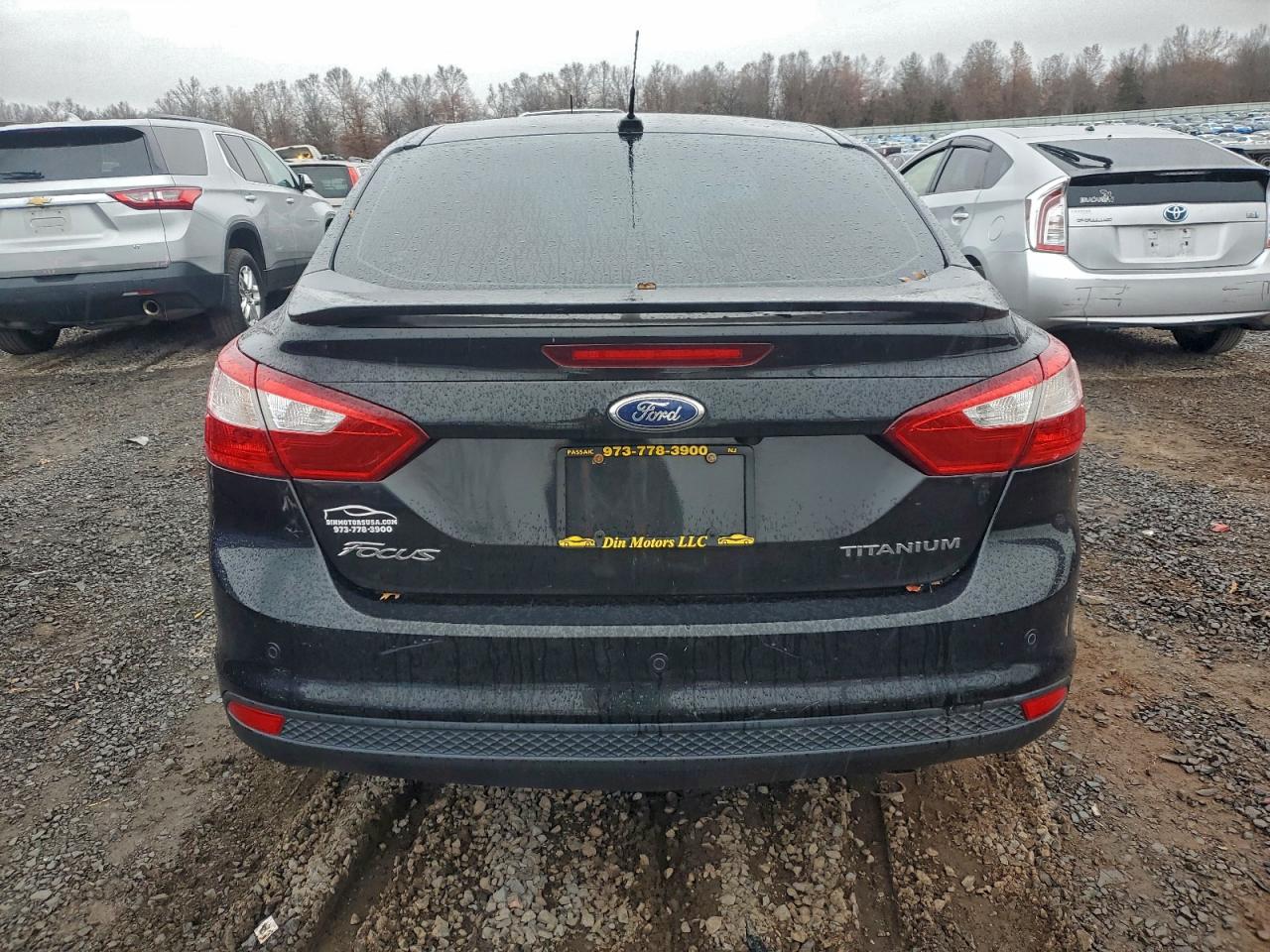 2013 Ford Focus Titanium VIN: 1FADP3J20DL103346 Lot: 94562195