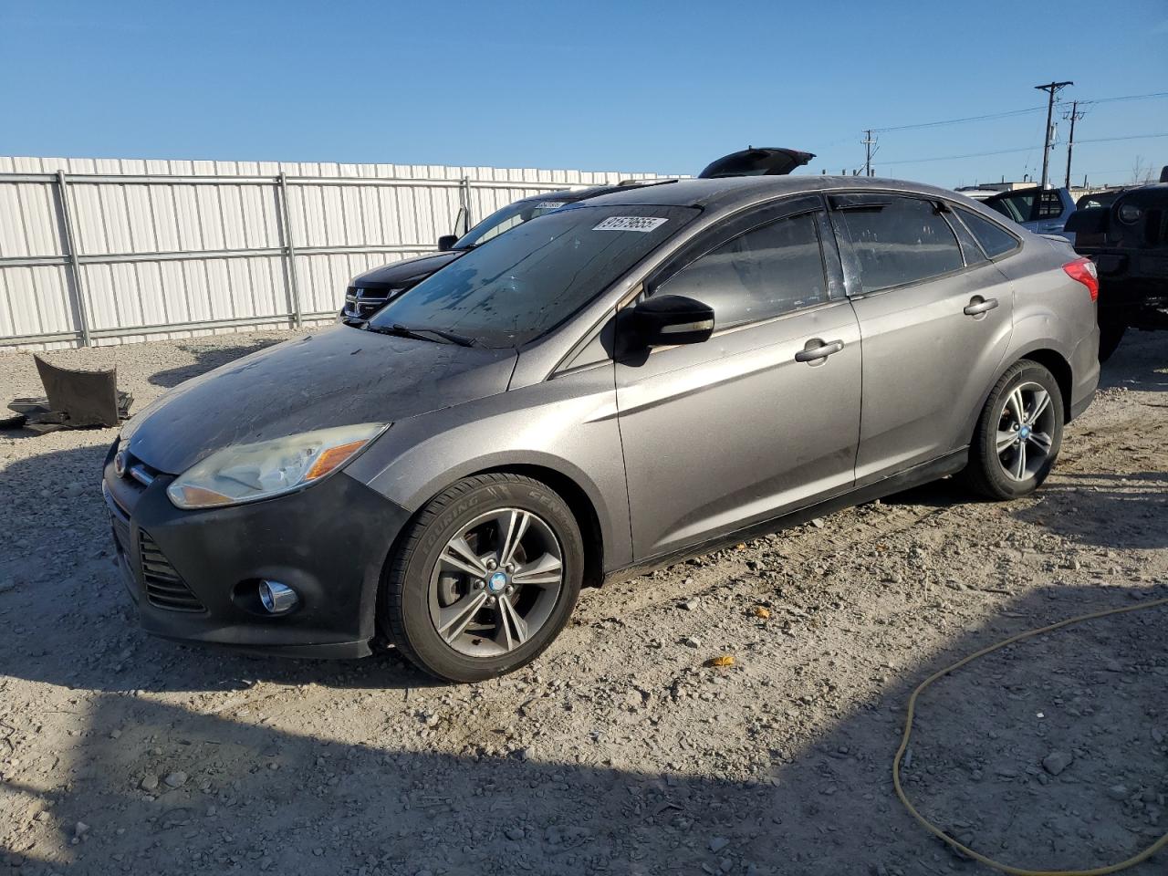 1FAHP3F29CL129520 FORD FOCUS Photo 1