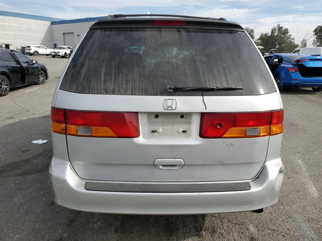 2002 Honda Odyssey Ex VIN: 2HKRL186X2H560420 Lot: 92046615