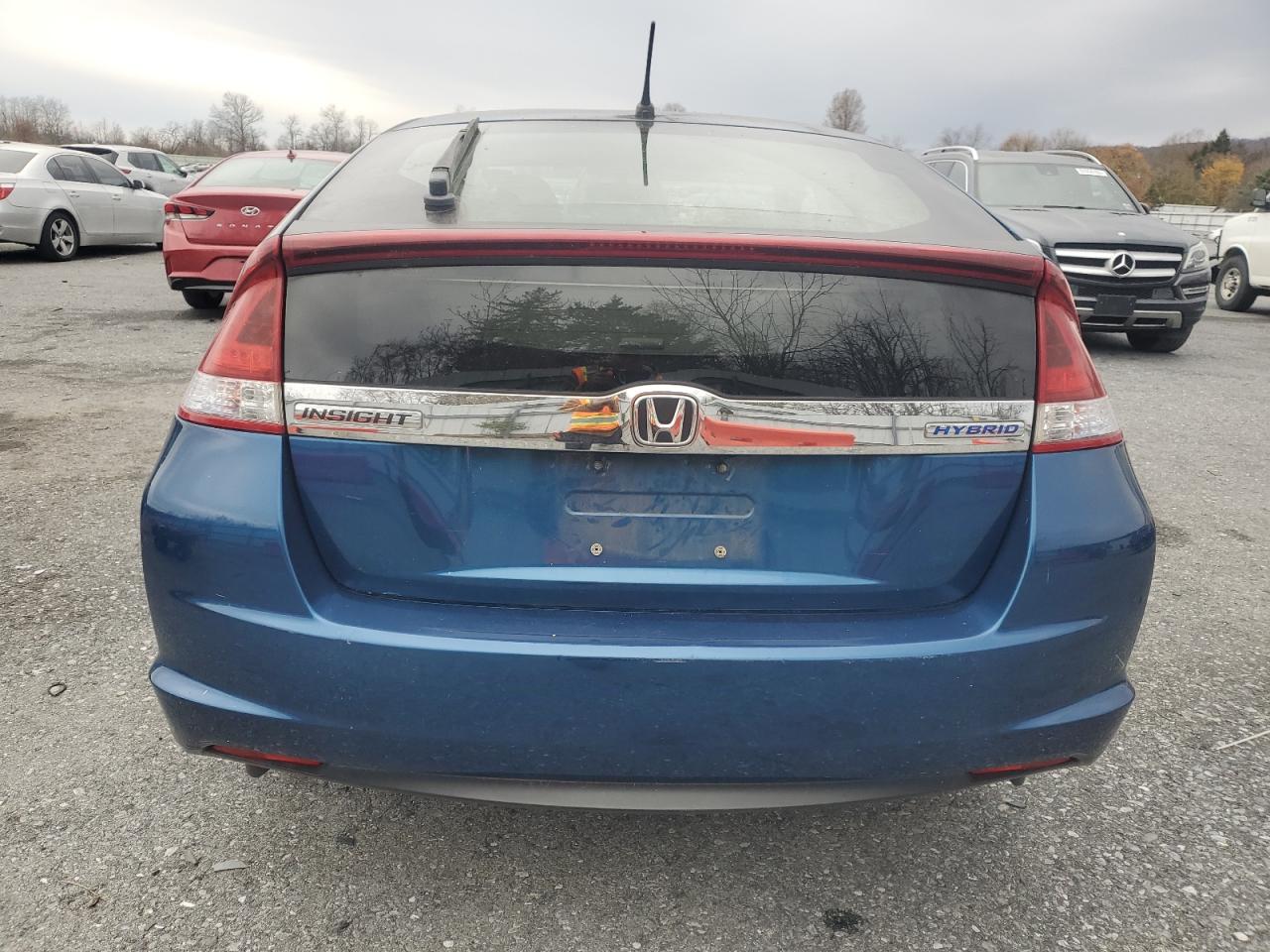 2013 Honda Insight VIN: JHMZE2H34DS002085 Lot: 93404865