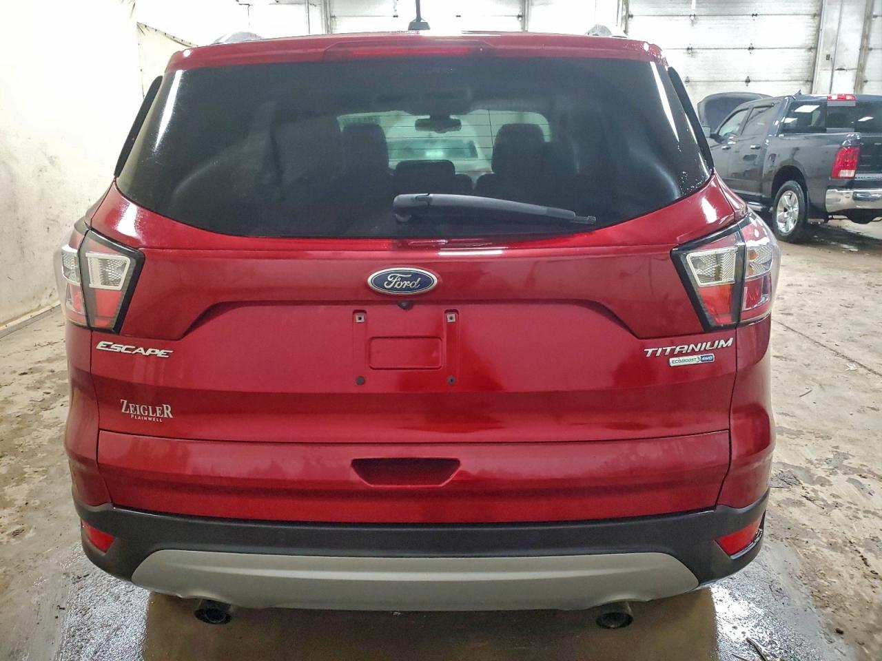 2017 Ford Escape Titanium VIN: 1FMCU9JD4HUD09834 Lot: 94437575