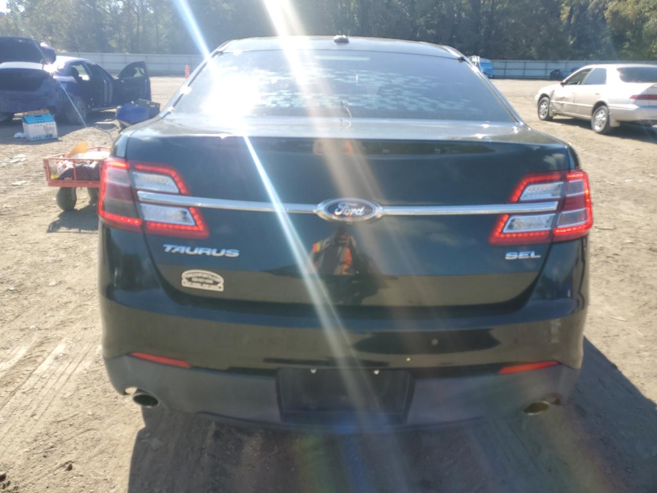 2015 Ford Taurus Sel VIN: 1FAHP2H81FG172371 Lot: 90364785