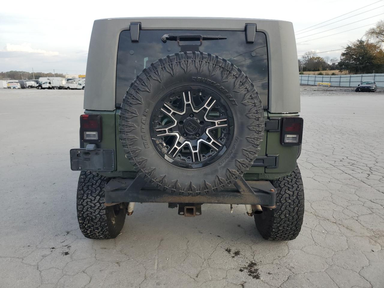 2007 Jeep Wrangler Sahara VIN: 1J4FA54127L153246 Lot: 91785035