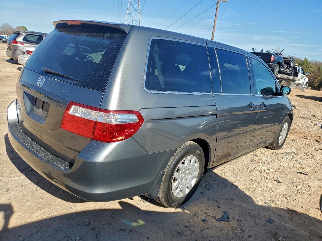 2007 Honda Odyssey Lx VIN: 5FNRL38257B099934 Lot: 94288185
