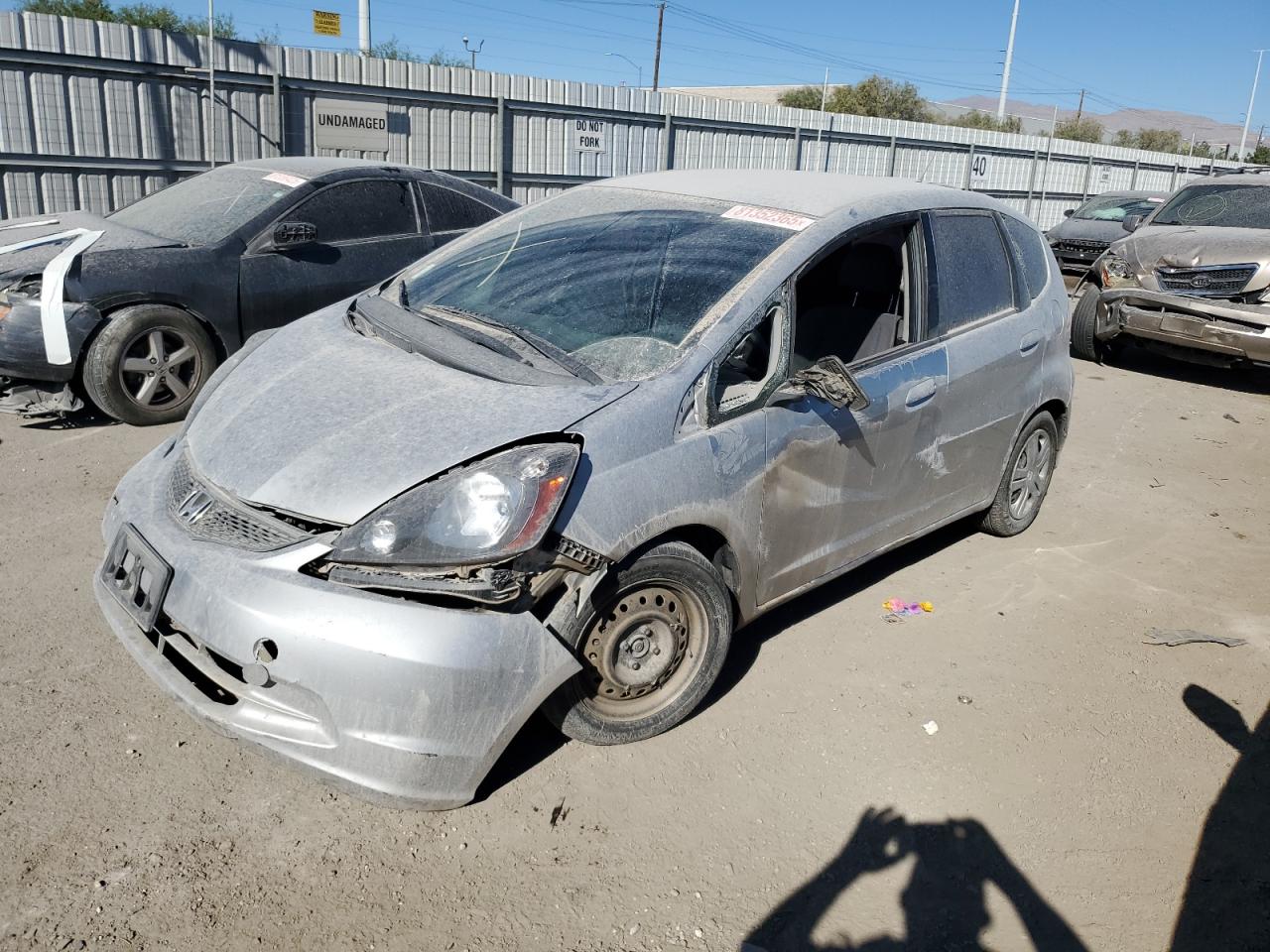 2011 Honda Fit silver hatchback gasoline JHMGE8H30BC010301 photo #1