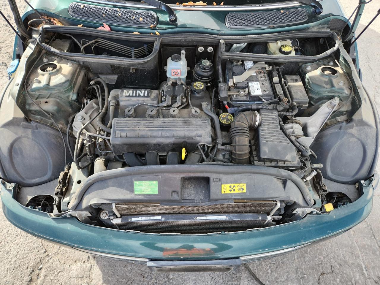 2006 Mini Cooper VIN: WMWRC33536TK71128 Lot: 92328415