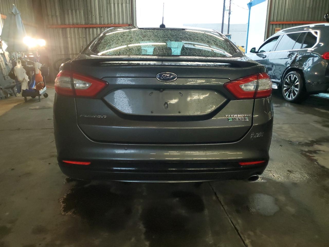 2015 Ford Fusion Titanium Phev VIN: 3FA6P0SU8FR214061 Lot: 93928535