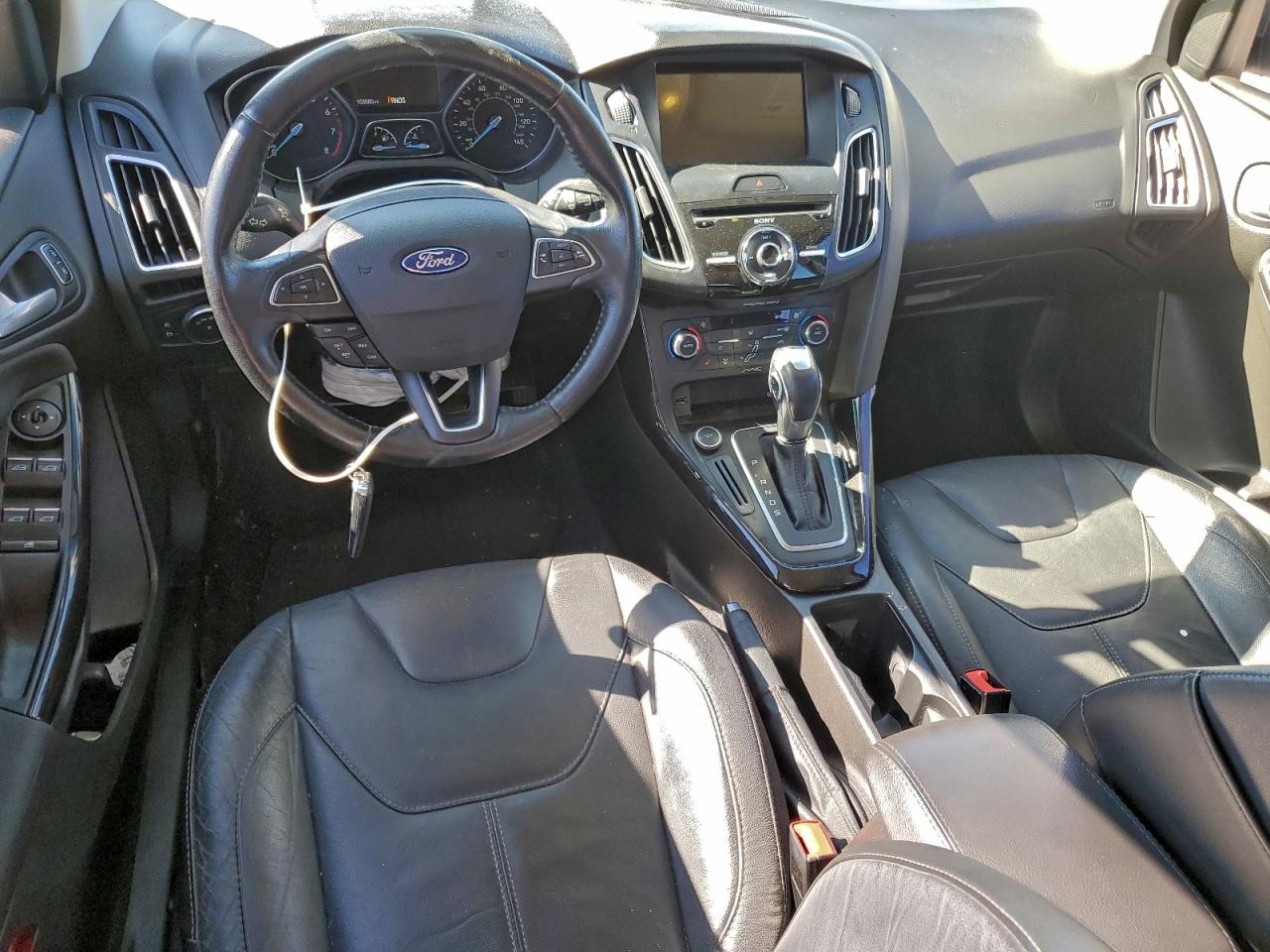 2016 Ford Focus Titanium VIN: 1FADP3N21GL259930 Lot: 94729485