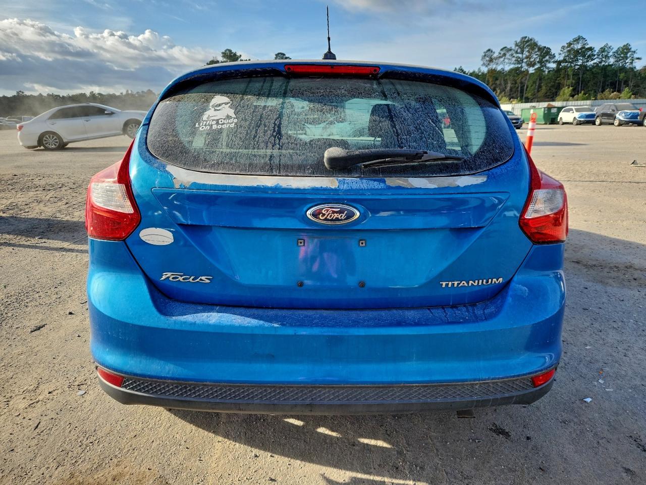 2012 Ford Focus Titanium VIN: 1FAHP3N27CL308656 Lot: 94261485