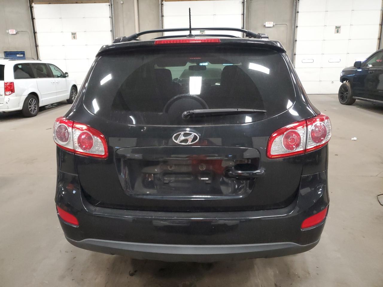 2011 Hyundai Santa Fe Se VIN: 5XYZHDAG5BG054815 Lot: 92952415