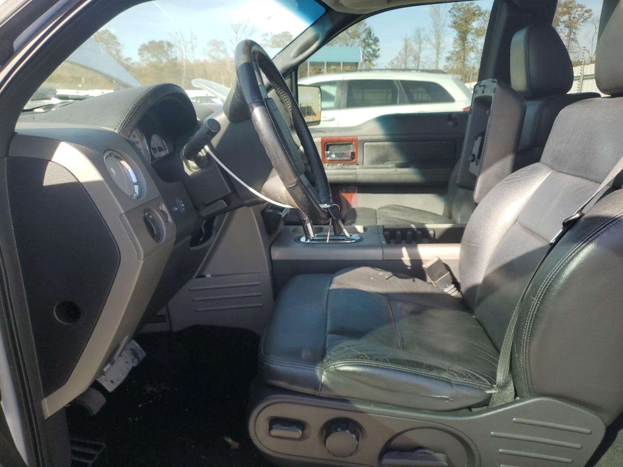 2007 Ford F150 VIN: 1FTPX12557FA38825 Lot: 92702005