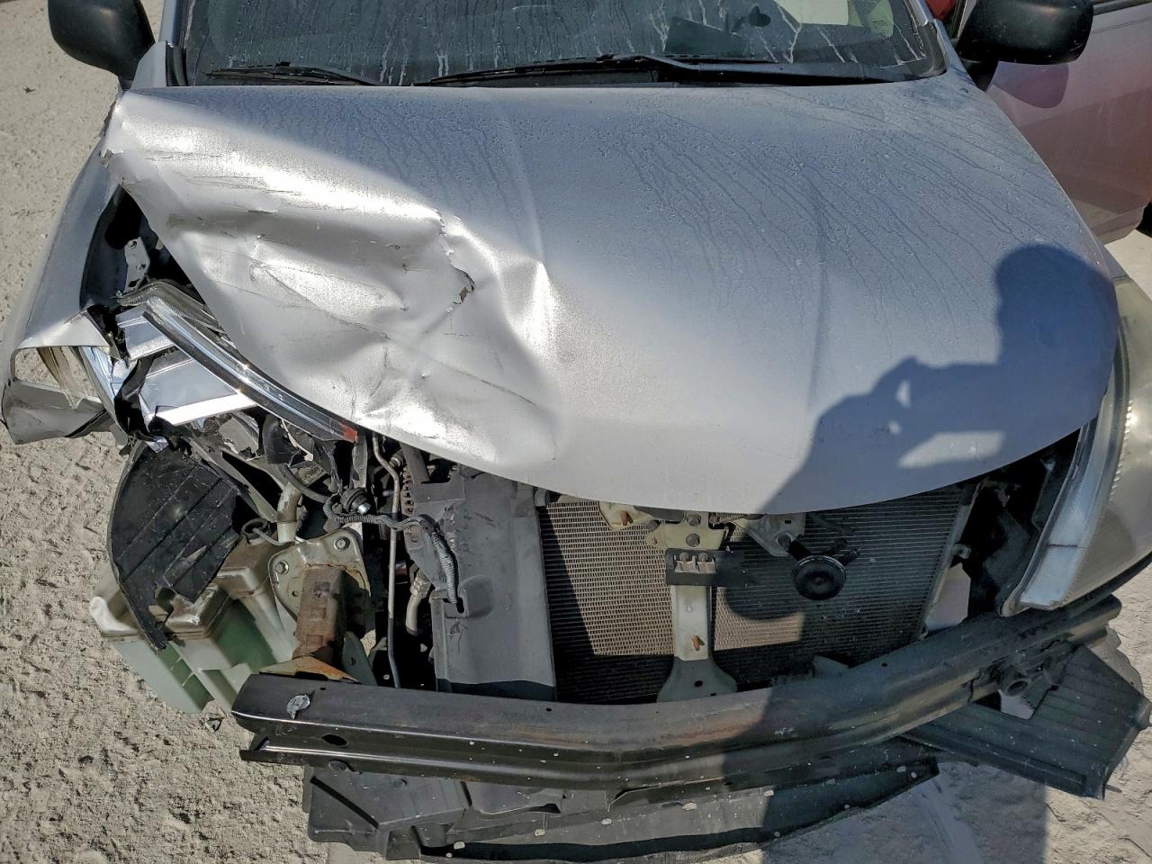 2009 Nissan Versa S VIN: 3N1CC11E69L499717 Lot: 94538435