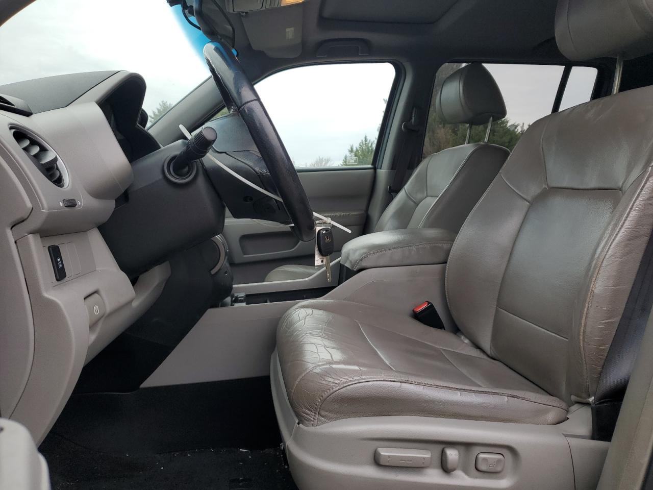 2012 Honda Pilot Exl VIN: 5FNYF4H53CB020774 Lot: 92995875