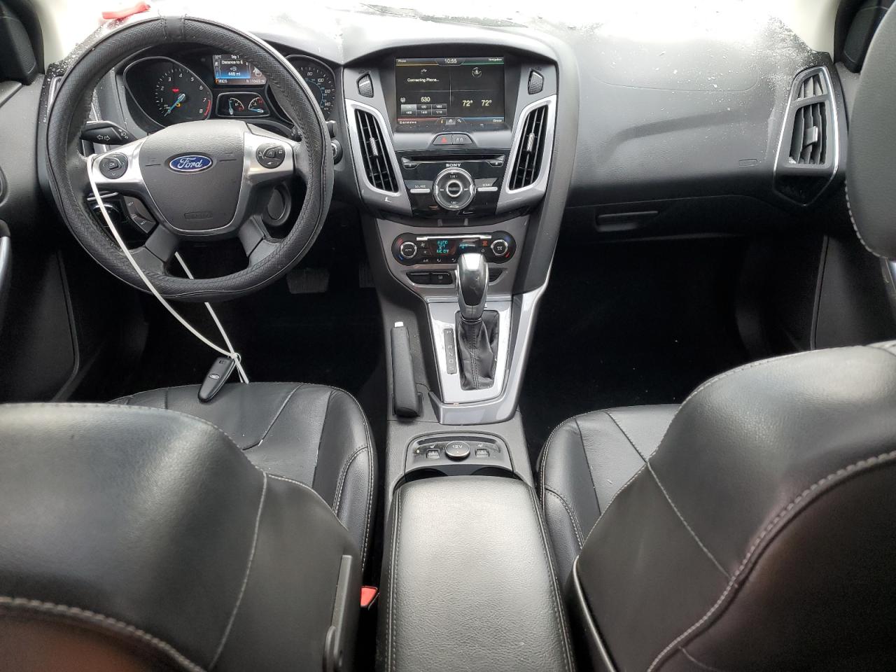 2014 Ford Focus Titanium VIN: 1FADP3J2XEL428703 Lot: 91910915