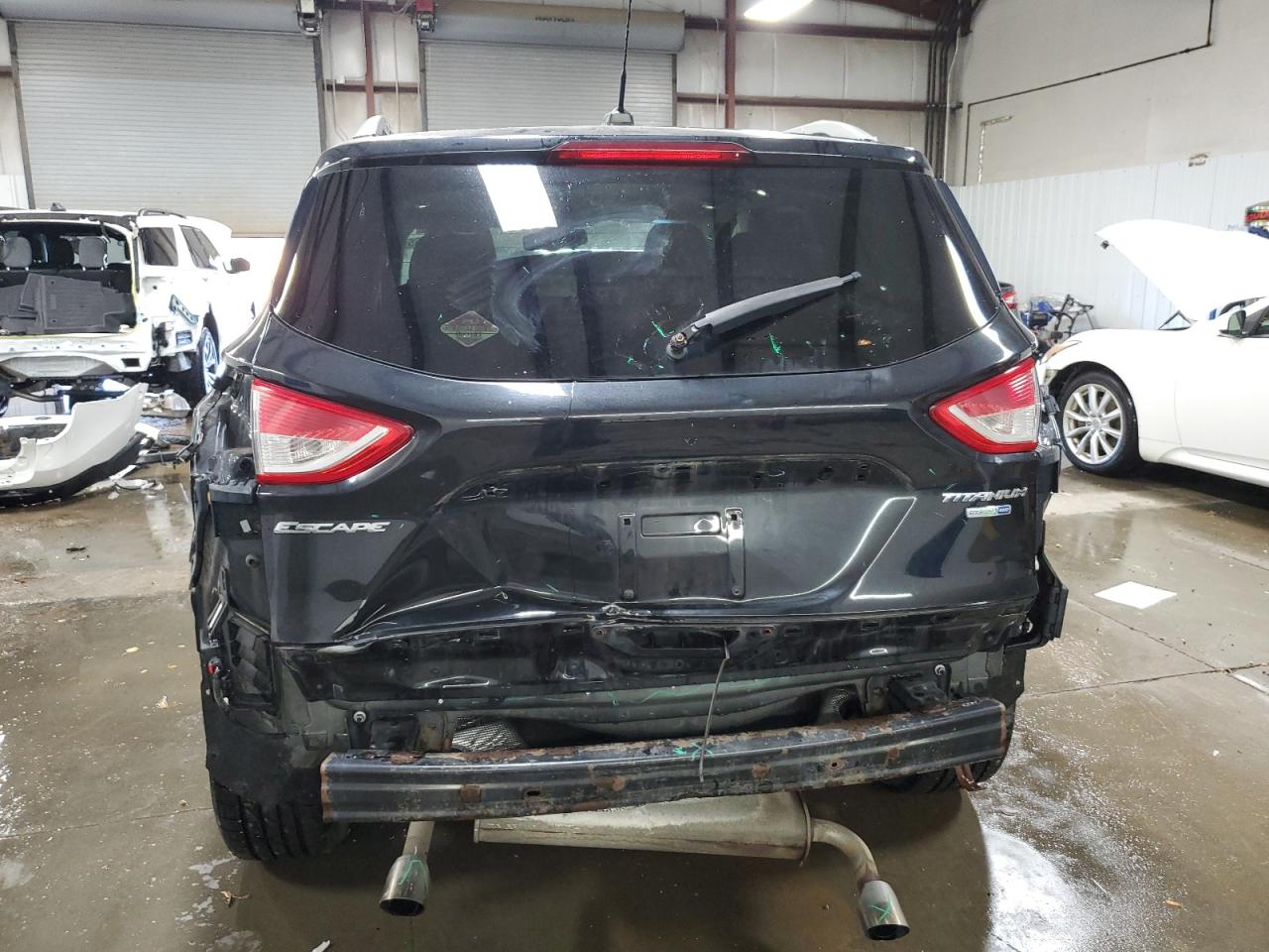 2014 Ford Escape Titanium VIN: 1FMCU9J91EUA16593 Lot: 92089465
