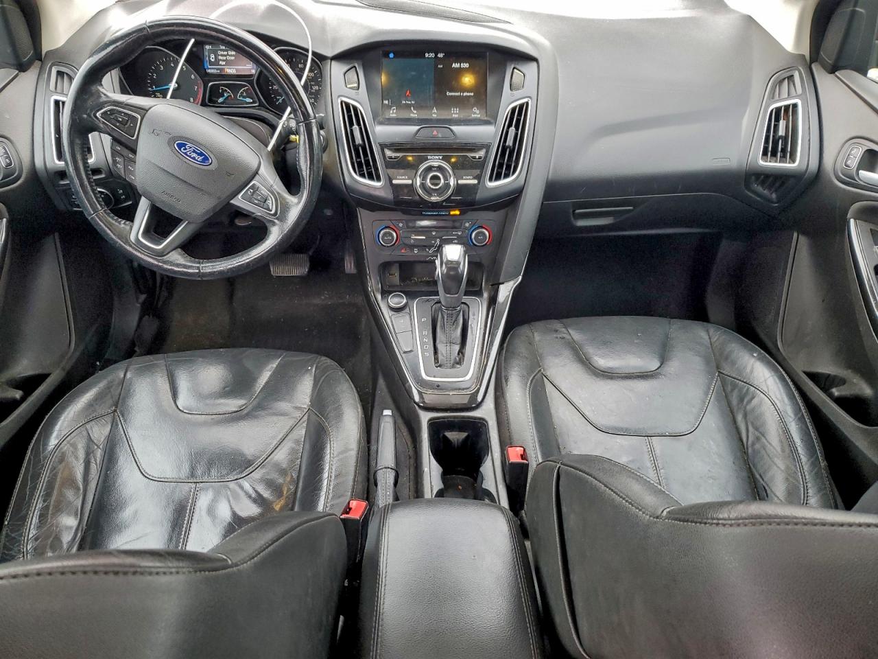 2016 Ford Focus Titanium VIN: 1FADP3J20GL256605 Lot: 93925575