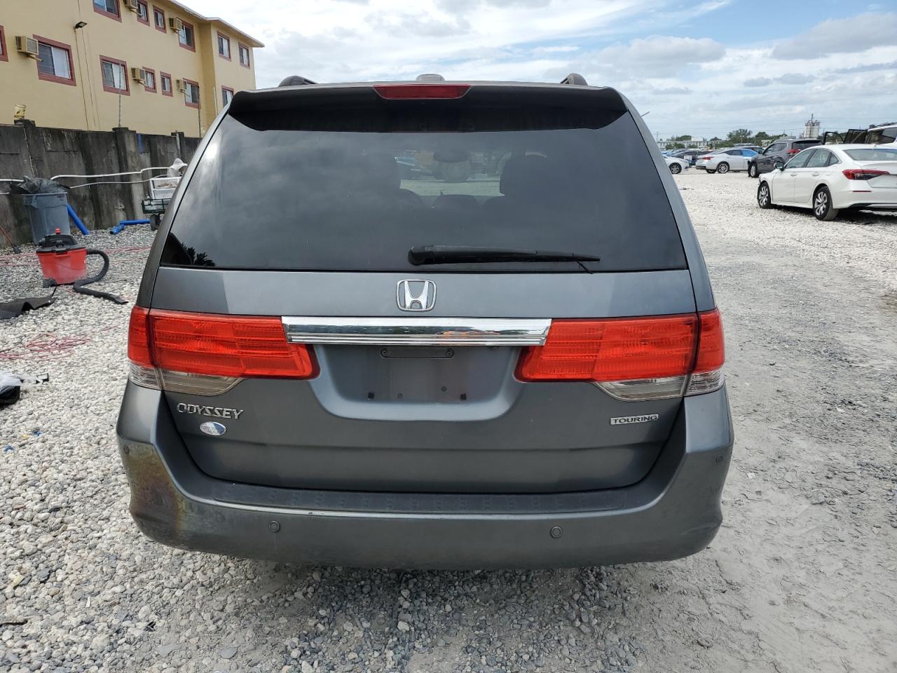 2010 Honda Odyssey Touring VIN: 5FNRL3H90AB017709 Lot: 90589055