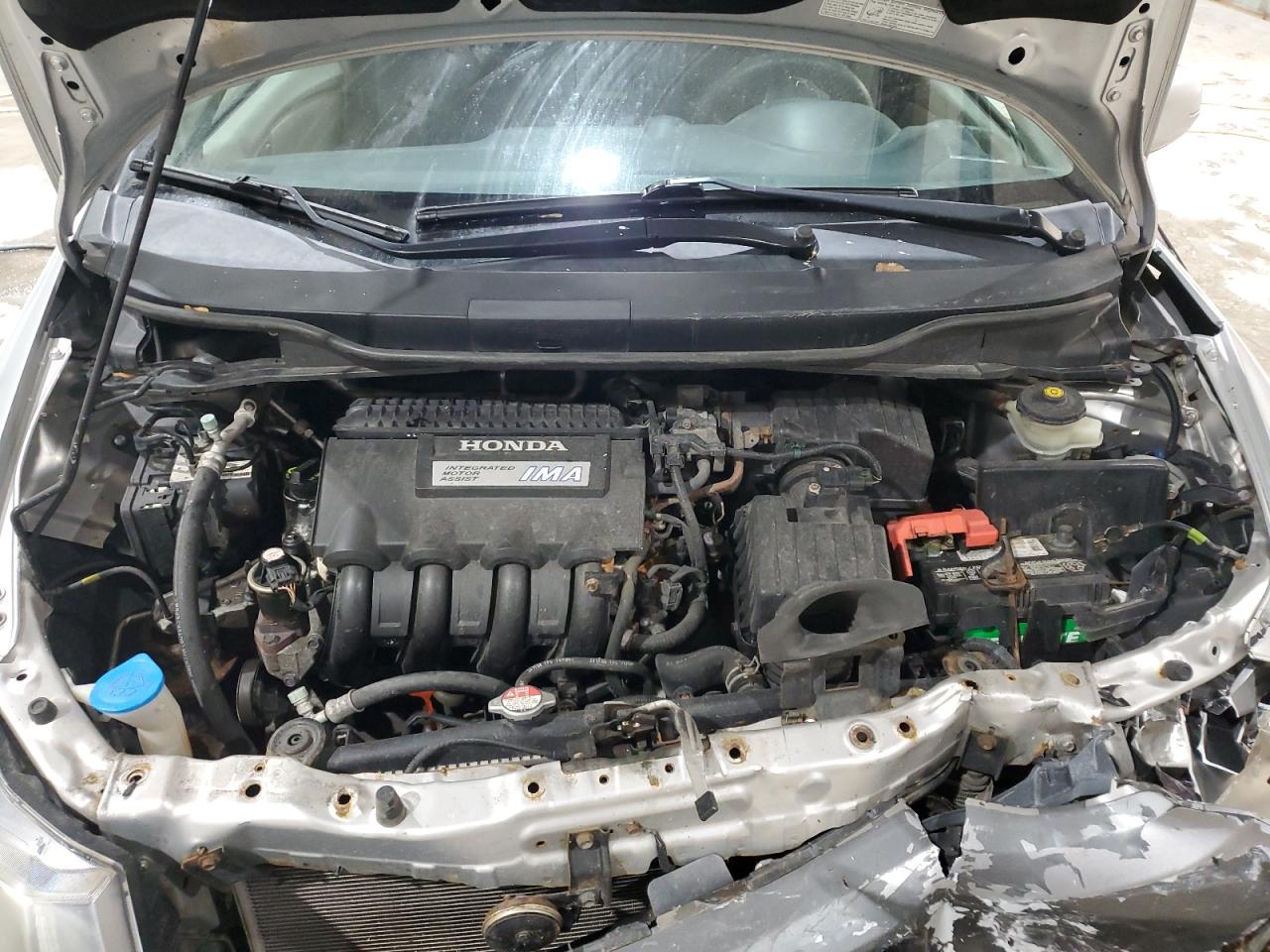 2010 Honda Insight Ex VIN: JHMZE2H79AS002145 Lot: 92627145