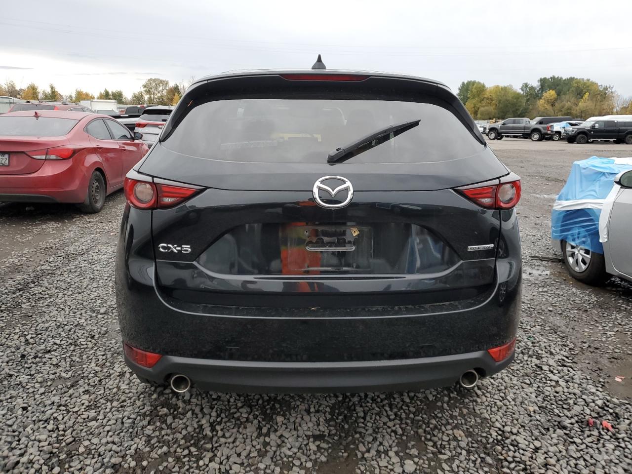 2021 Mazda Cx-5 Grand Touring VIN: JM3KFADM7M1318201 Lot: 91424295