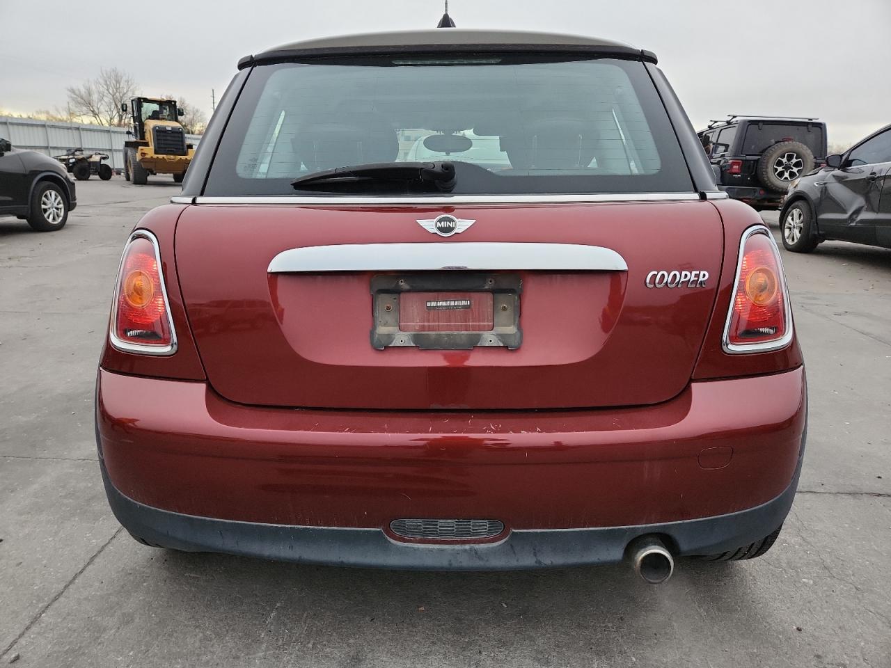 2009 Mini Cooper VIN: WMWMF33519TT69788 Lot: 93378325