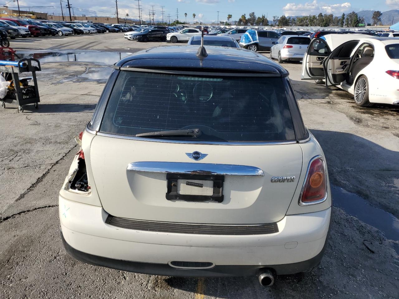 2009 Mini Cooper VIN: WMWMF33559TW75540 Lot: 92905365