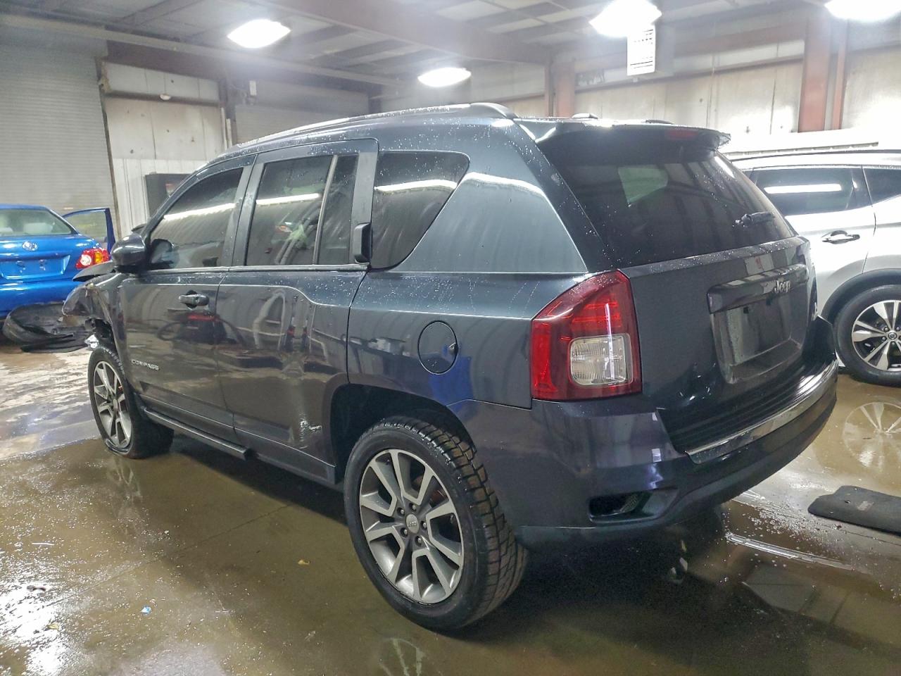 2014 Jeep Compass Limited VIN: 1C4NJCCB1ED652580 Lot: 94750435
