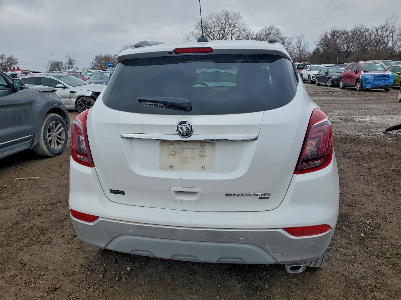 2019 Buick Encore Essence VIN: KL4CJGSM9KB908306 Lot: 94346595