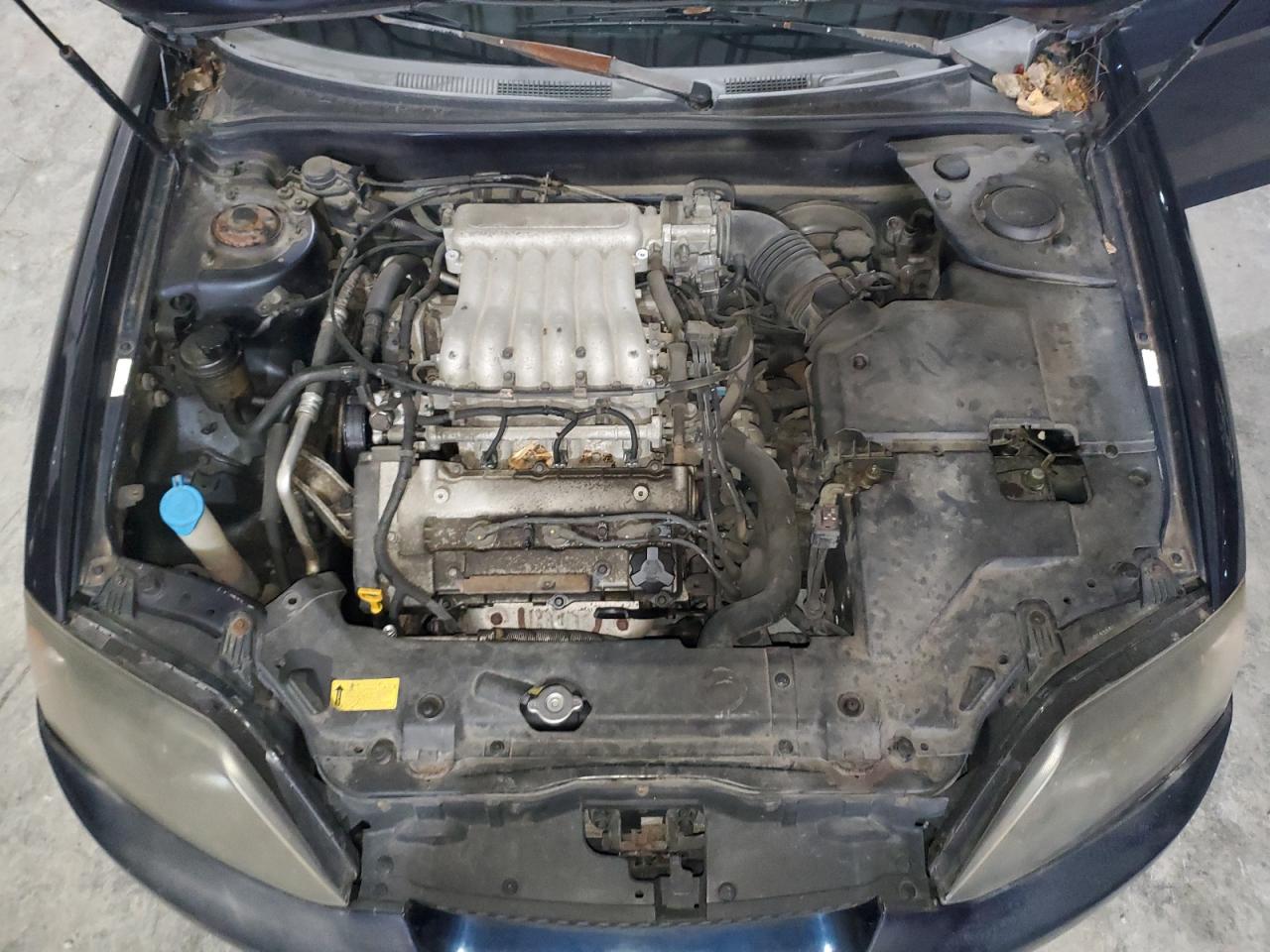 2005 Hyundai Tiburon Gt VIN: KMHHN65F65U169620 Lot: 91893745