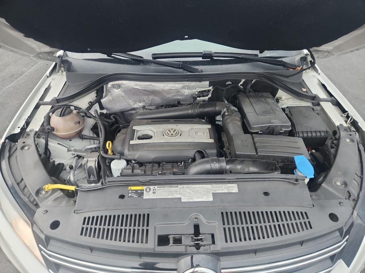 2014 Volkswagen Tiguan S VIN: WVGAV3AX8EW559704 Lot: 91932475