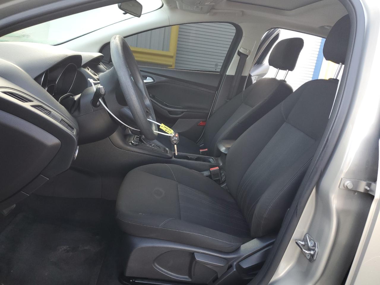 2015 Ford Focus Se VIN: 1FADP3F21FL201801 Lot: 92219945