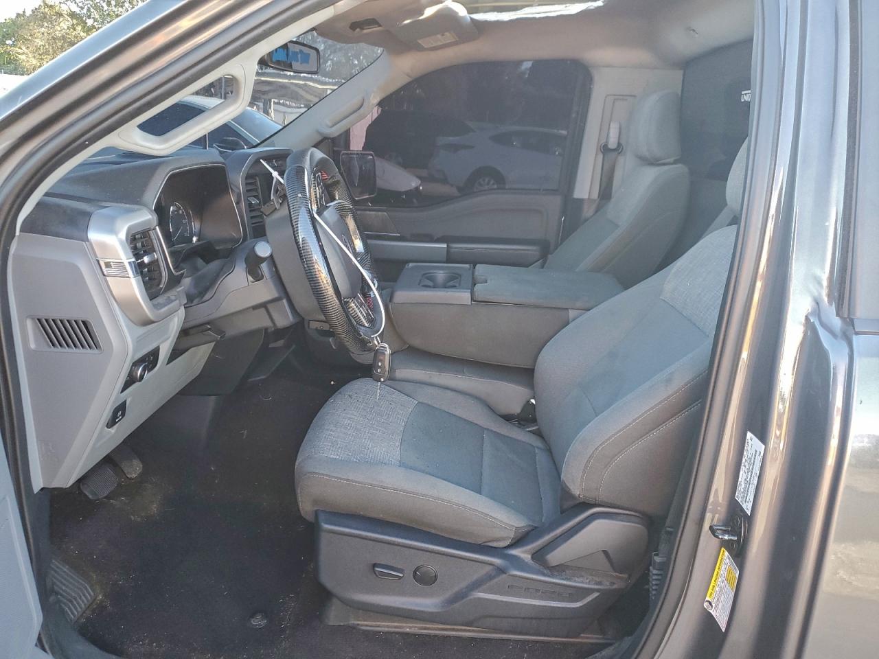 2022 Ford F150 VIN: 1FTMF1E52NKE23281 Lot: 94124625