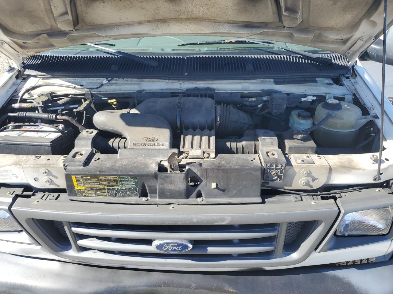 2004 Ford Econoline E150 Van VIN: 1FTRE14W64HA43844 Lot: 92843745